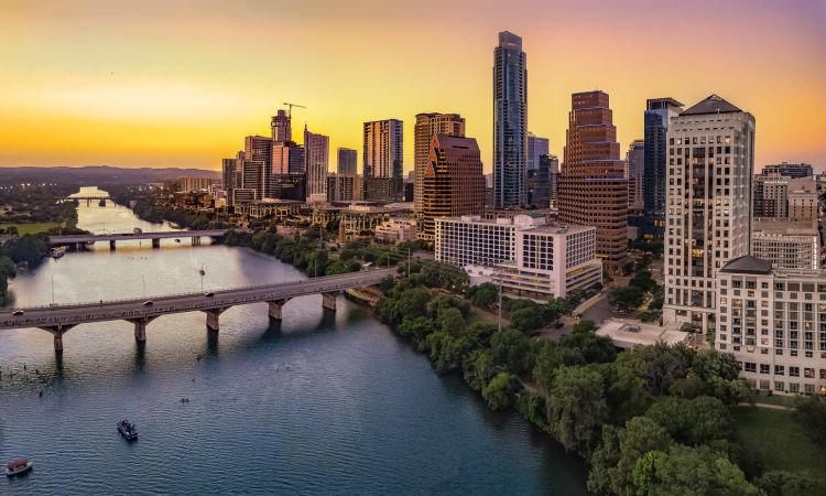 aerial view of austin texas skyline at sunset