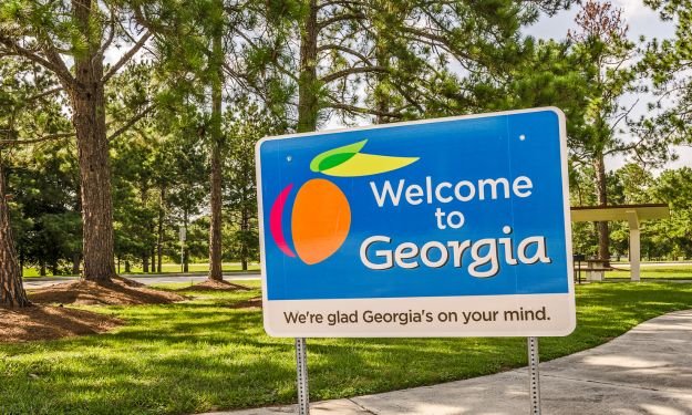 roadside sign welcoming new people to Georgia